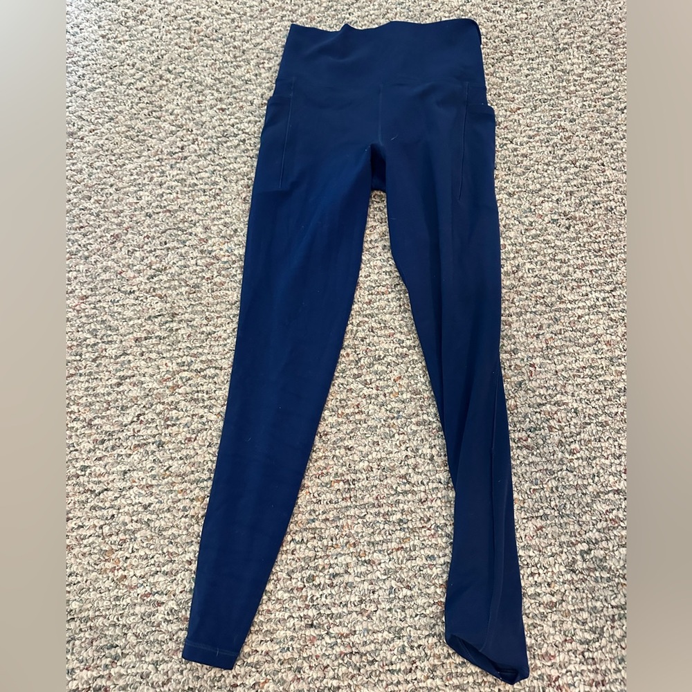 Blue and black/gray leggings. Worn less than 5 times.